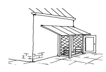 Overdækket plads med opkant, som er afskærmet mod nedbør.